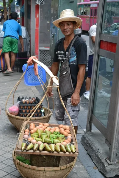 Venditore di street food a Bangkok